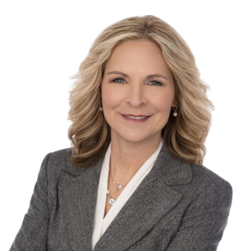 K H logo with green line down the middle